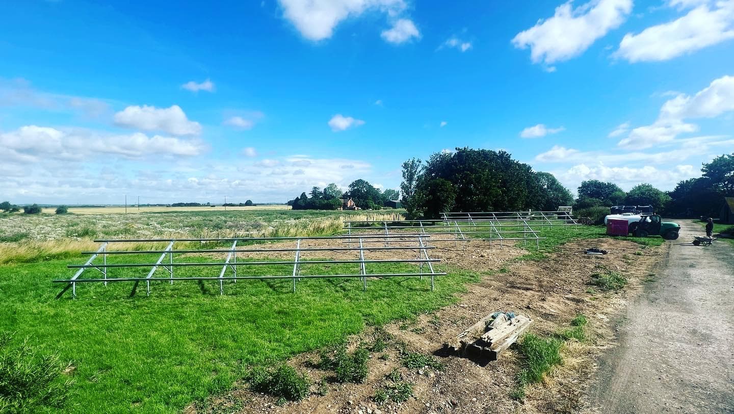 Galvanised mounting frames for a ground mounted array standing in a field